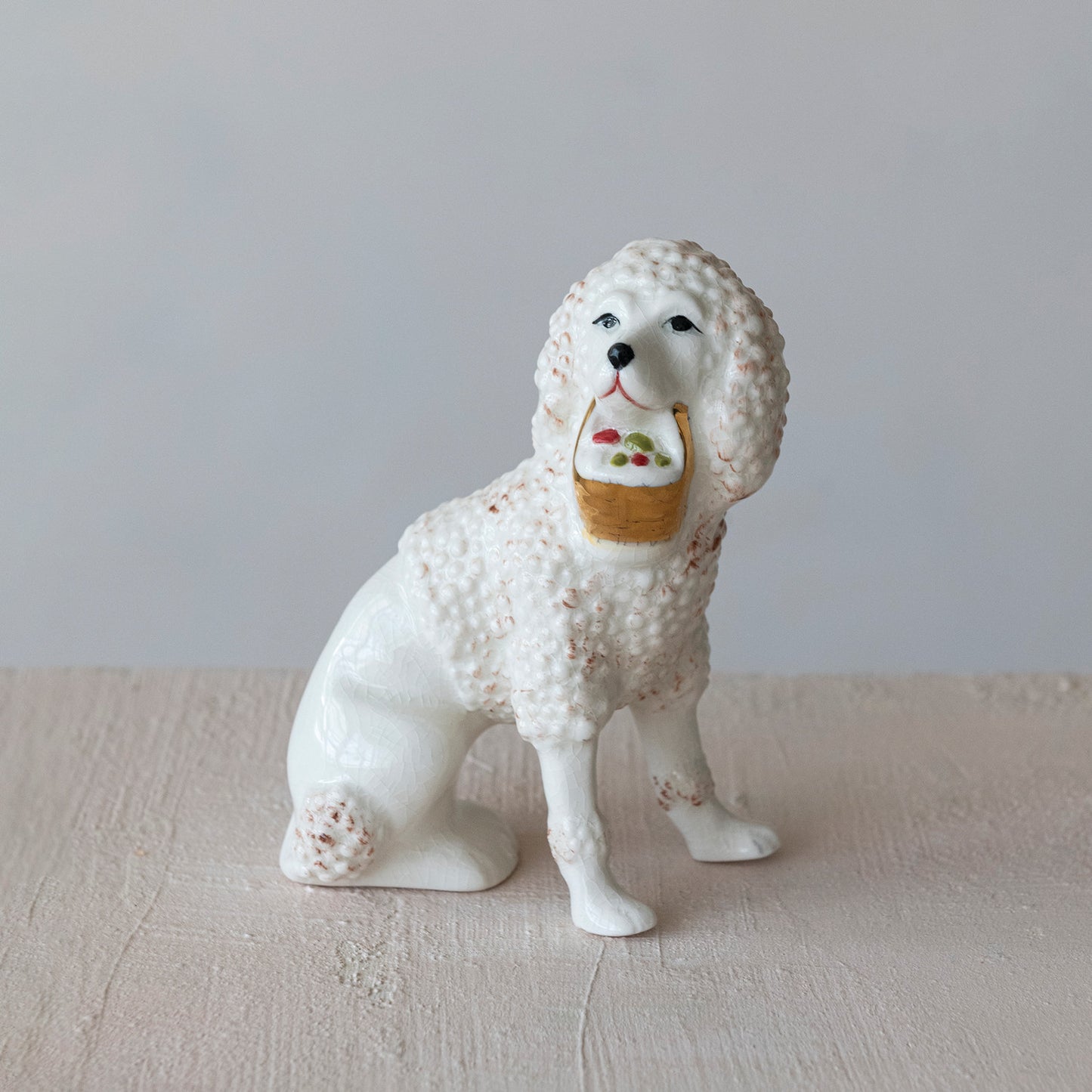 Stoneware Vintage Reproduction Staffordshire Poodle with Basket