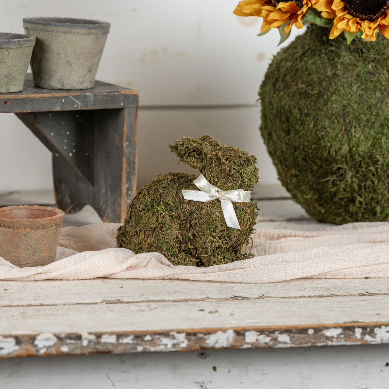 Sitting Moss Bunny with Cream Bow