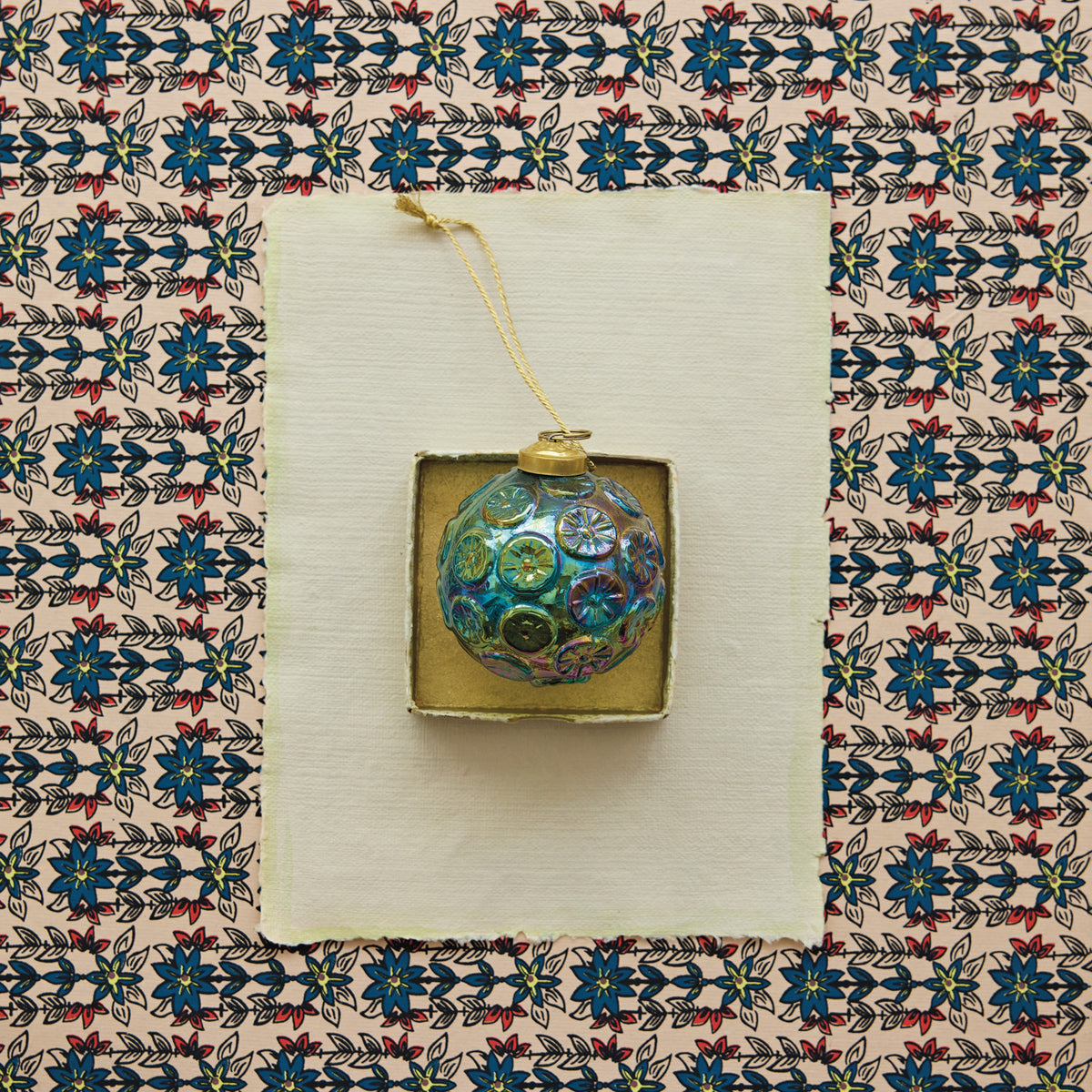 Hand-Blown Embossed Glass Ball Ornament with Pattern