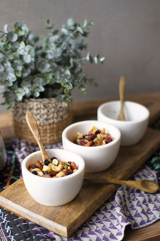 Three White Stone Serving Bowls with Wood Base and Spoons